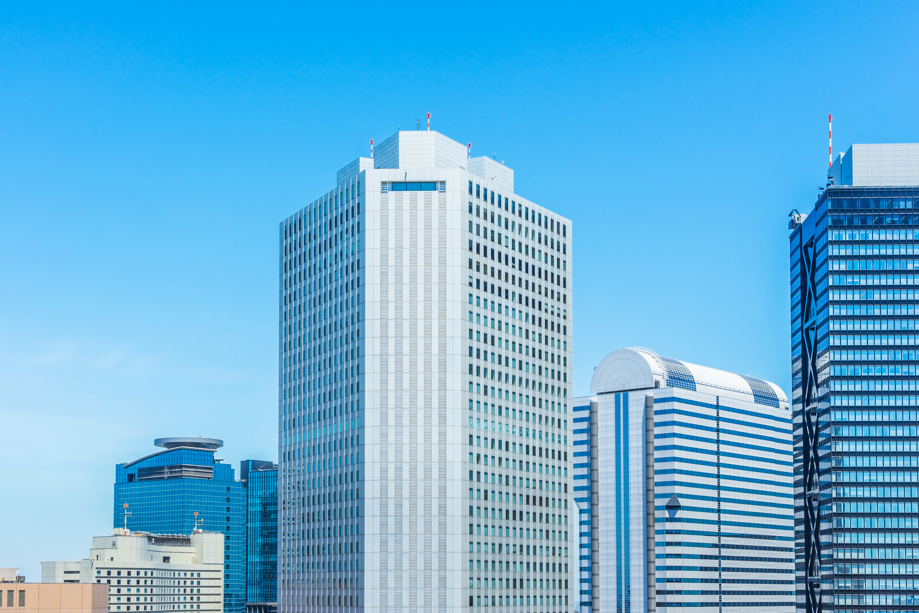 panoramic modern city skyline bird eye aerial view under blue sky in shinjuku, tokyo, japan